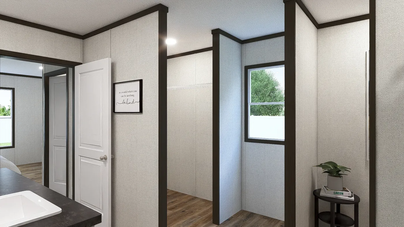 The DISCOVER Primary Bathroom. This Manufactured Mobile Home features 3 bedrooms and 2 baths.
