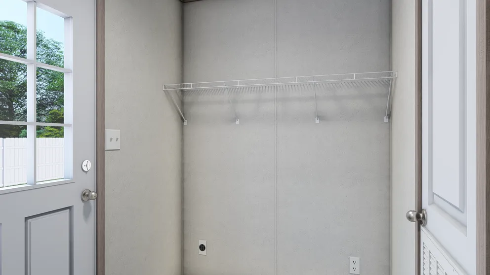 The 4028-E751 THE PULSE Utility Room. This Manufactured Mobile Home features 3 bedrooms and 2 baths.