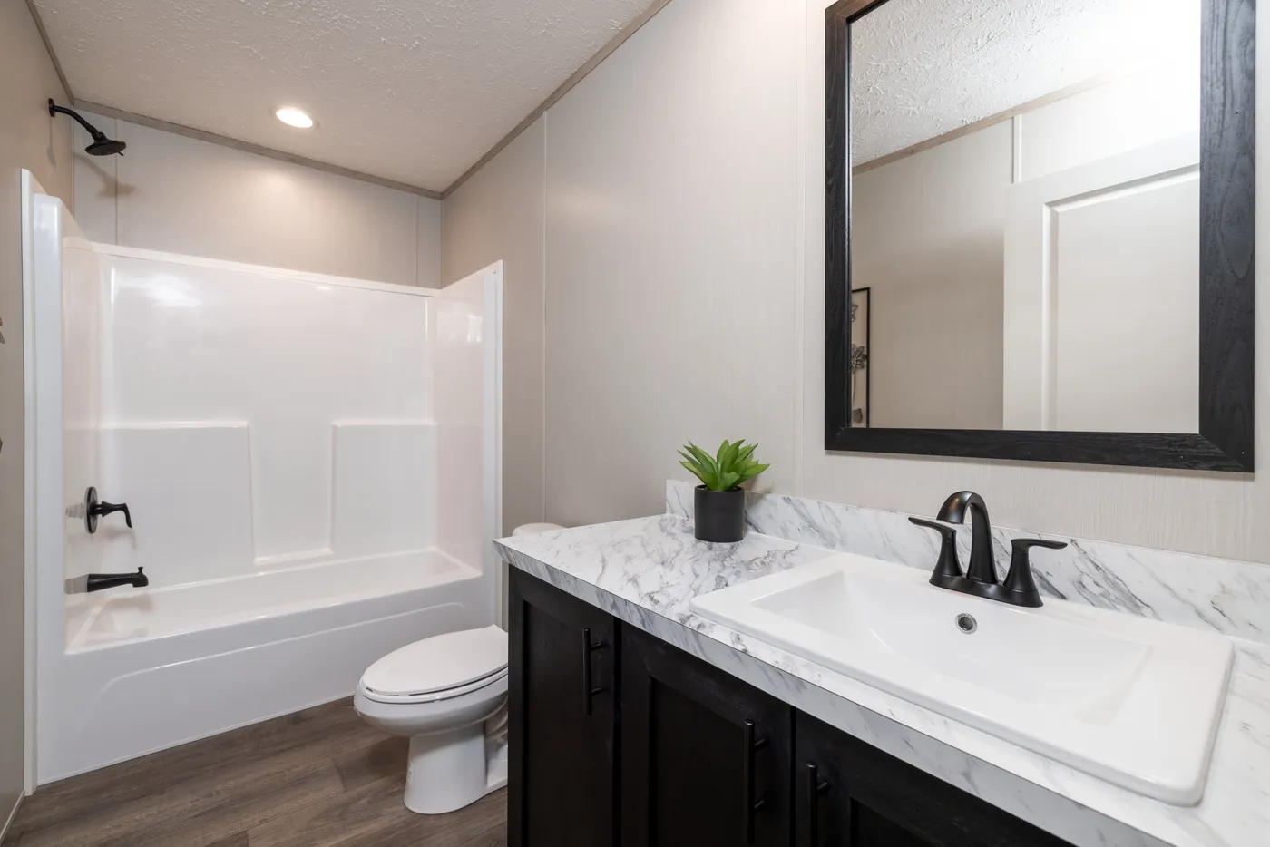 The VISION Guest Bathroom. This Manufactured Mobile Home features 4 bedrooms and 2 baths.