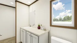The DYNAMIC Primary Bathroom. This Manufactured Mobile Home features 3 bedrooms and 2 baths.