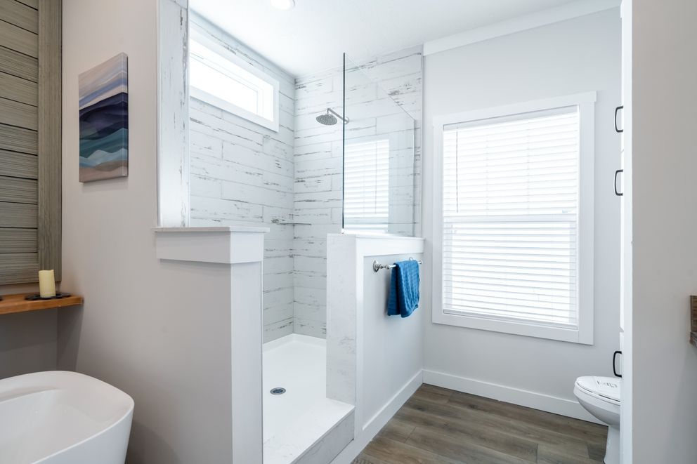 The 3459 HUD 64X28 CAROLINA Primary Bathroom. This Manufactured Mobile Home features 3 bedrooms and 2 baths.