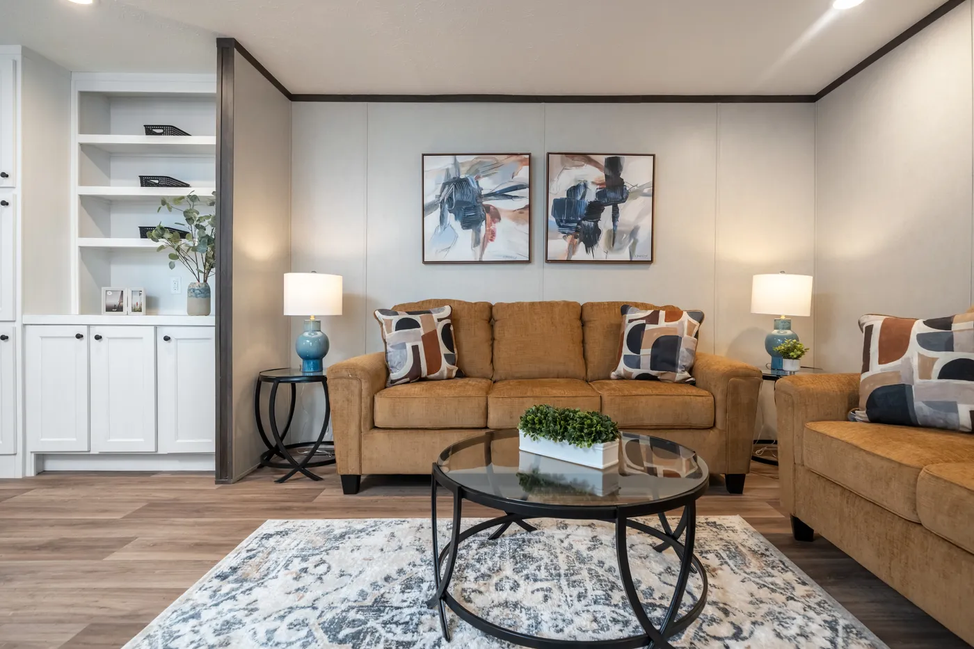 The ESSENCE Living Room. This Manufactured Mobile Home features 3 bedrooms and 2 baths.