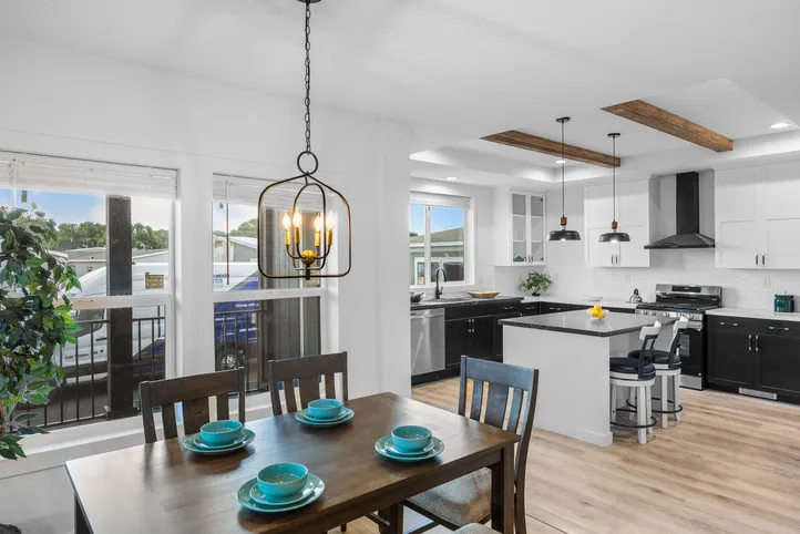 The LULAMAE 3 Dining Room. This Manufactured Mobile Home features 3 bedrooms and 2 baths.