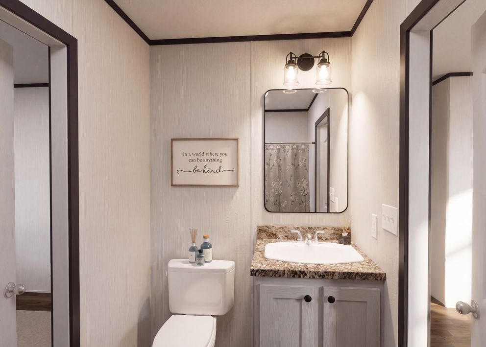 The THE FUSION 32H Guest Bathroom. This Manufactured Mobile Home features 5 bedrooms and 3 baths.