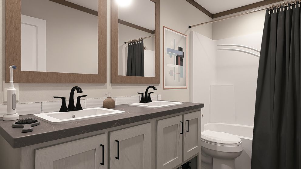 The EVERETT ELITE Guest Bathroom. This Manufactured Mobile Home features 4 bedrooms and 3 baths.