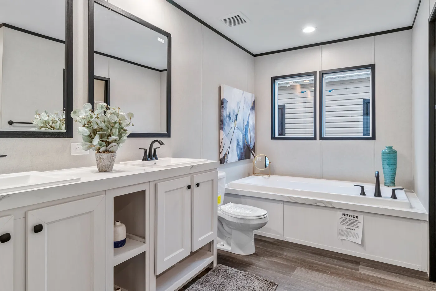 The THE RENEGADE Primary Bathroom. This Manufactured Mobile Home features 3 bedrooms and 2 baths.