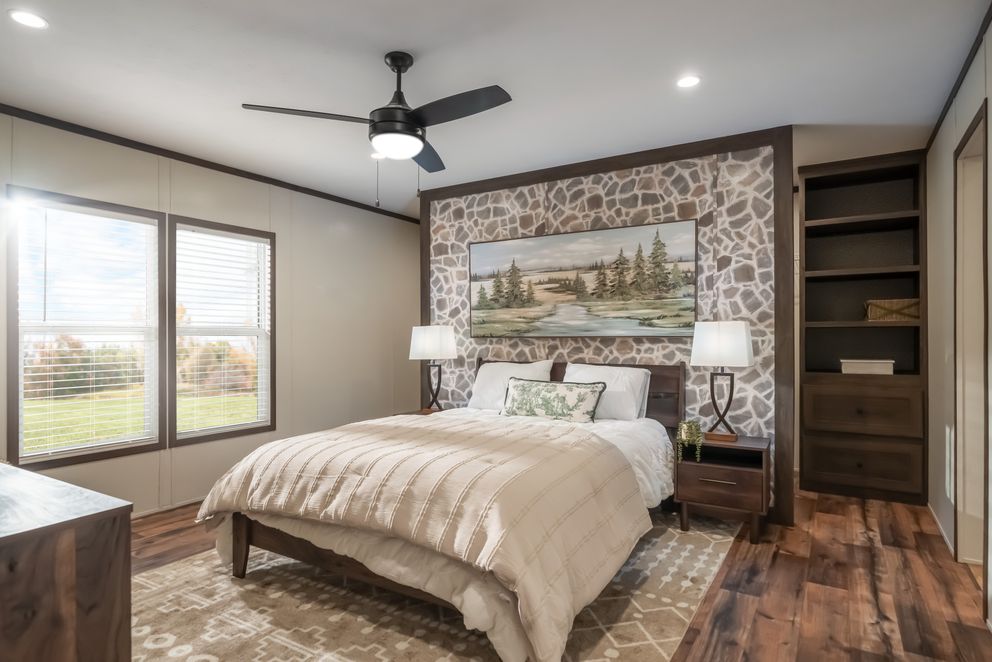 The MOUNTAIN VIEW Primary Bedroom. This Manufactured Mobile Home features 3 bedrooms and 2 baths.