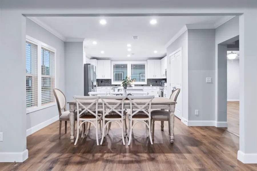 The THE OLYMPUS Dining Area. This Manufactured Mobile Home features 4 bedrooms and 3 baths.