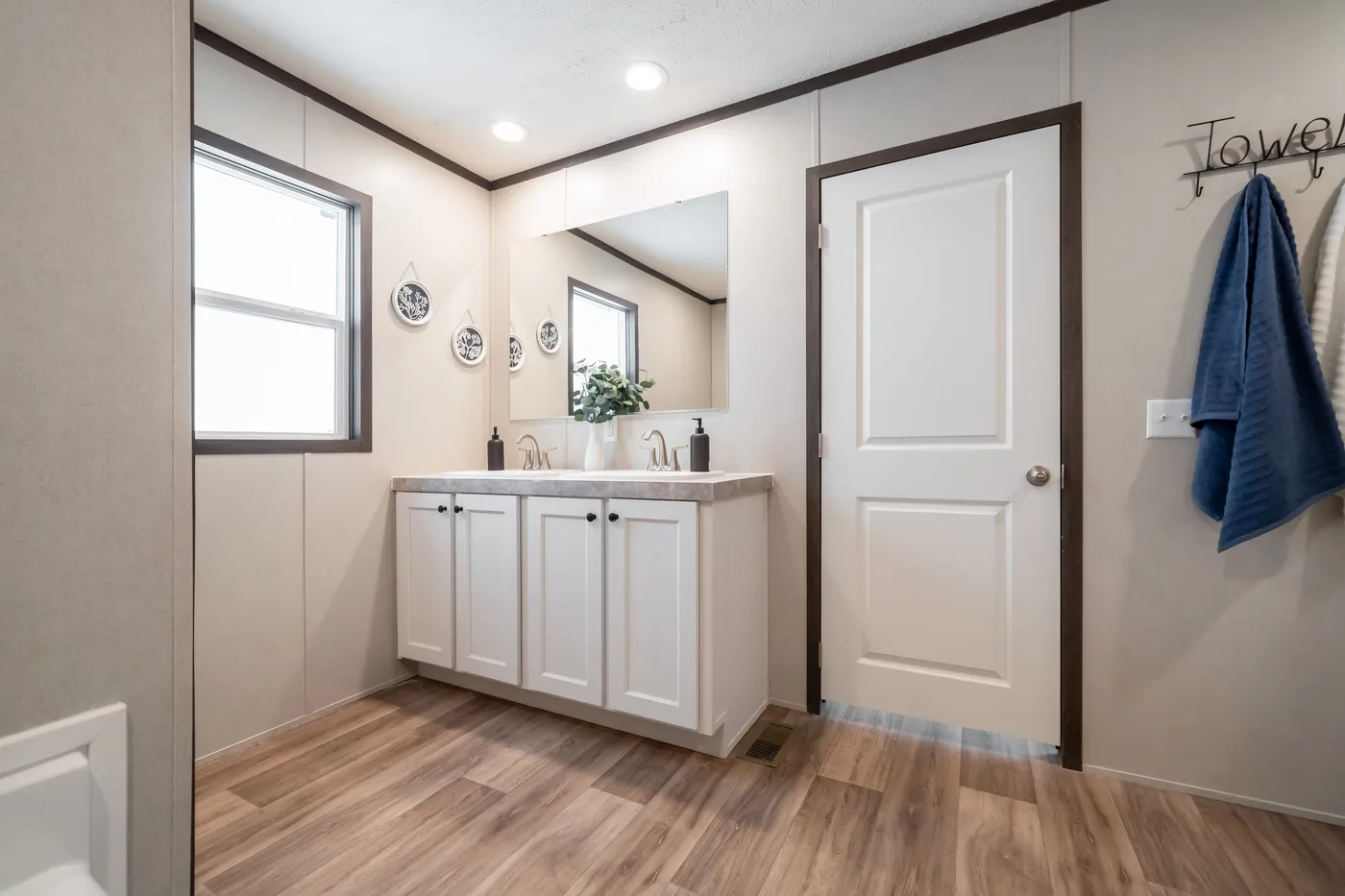 The DYNAMIC Primary Bathroom. This Manufactured Mobile Home features 3 bedrooms and 2 baths.