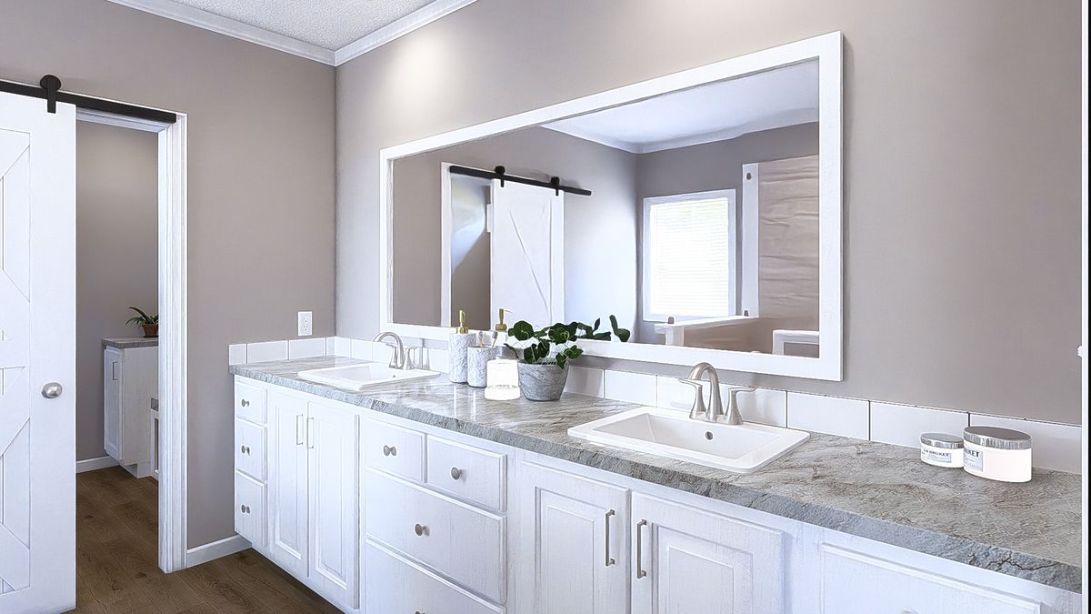 The THE ABIGAIL II Primary Bathroom. This Manufactured Mobile Home features 3 bedrooms and 2 baths.