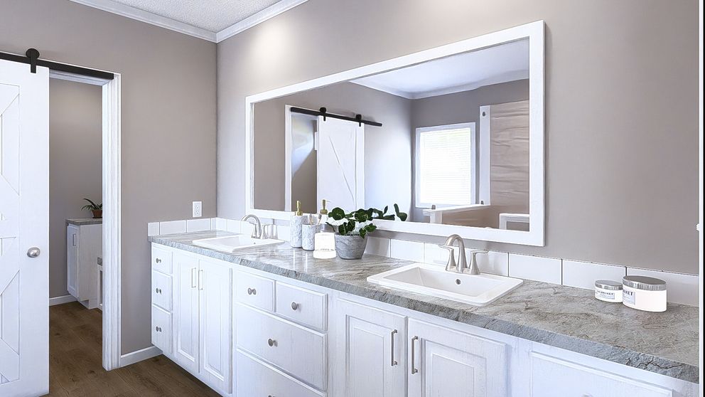 The THE ABIGAIL II Primary Bathroom. This Manufactured Mobile Home features 3 bedrooms and 2 baths.