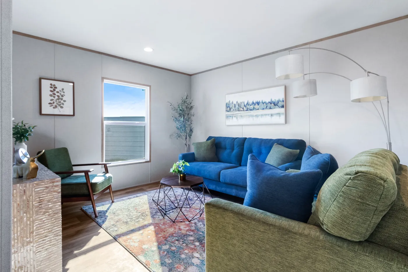 The ASPIRE Sitting Room. This Manufactured Mobile Home features 3 bedrooms and 2 baths.
