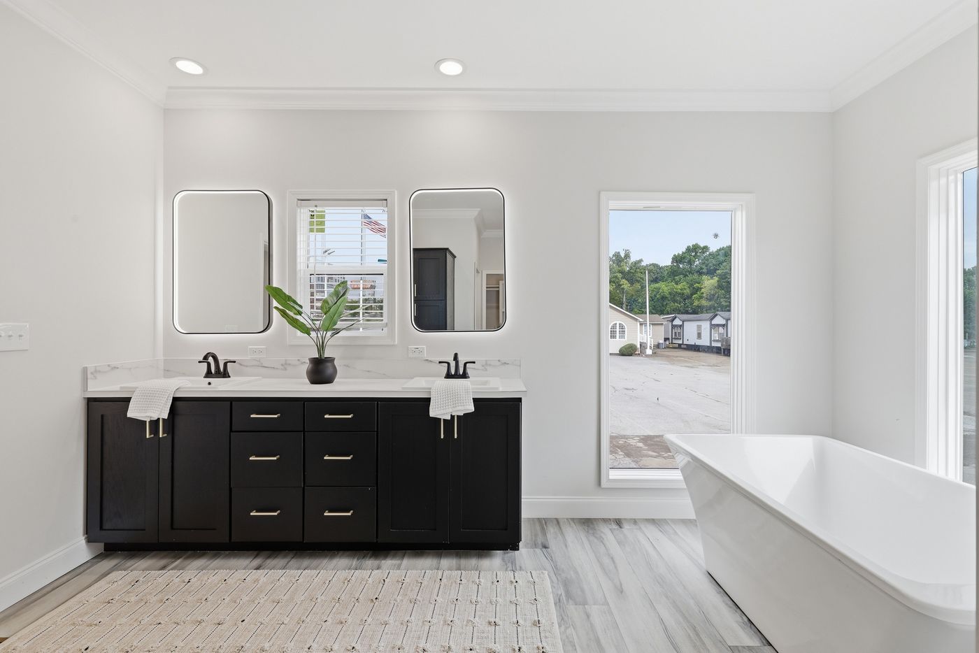The THE SUMMIT Primary Bathroom. This Manufactured Mobile Home features 3 bedrooms and 2 baths.