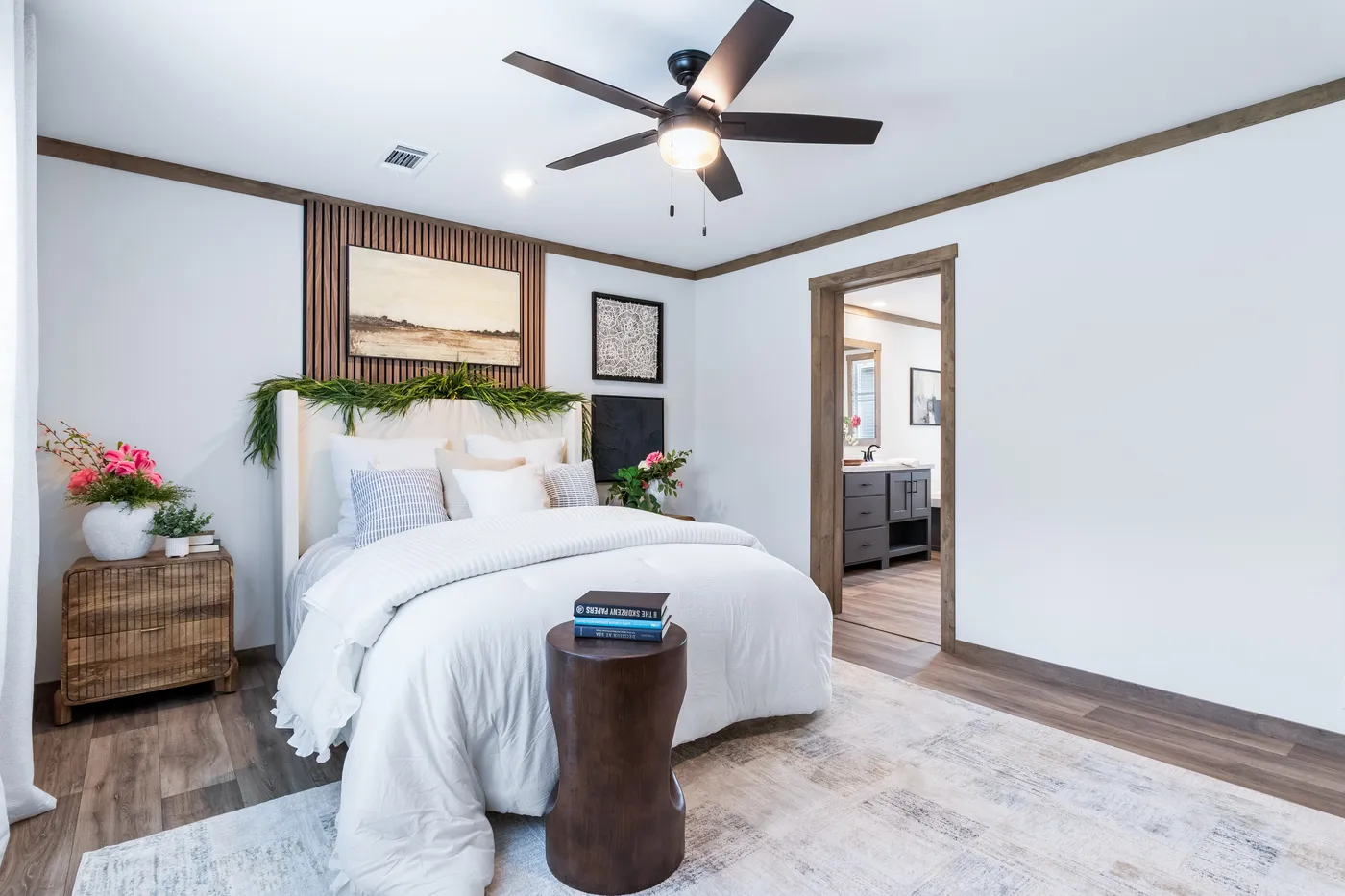 The FARM 3 FLEX Primary Bedroom. This Manufactured Mobile Home features 3 bedrooms and 2 baths.