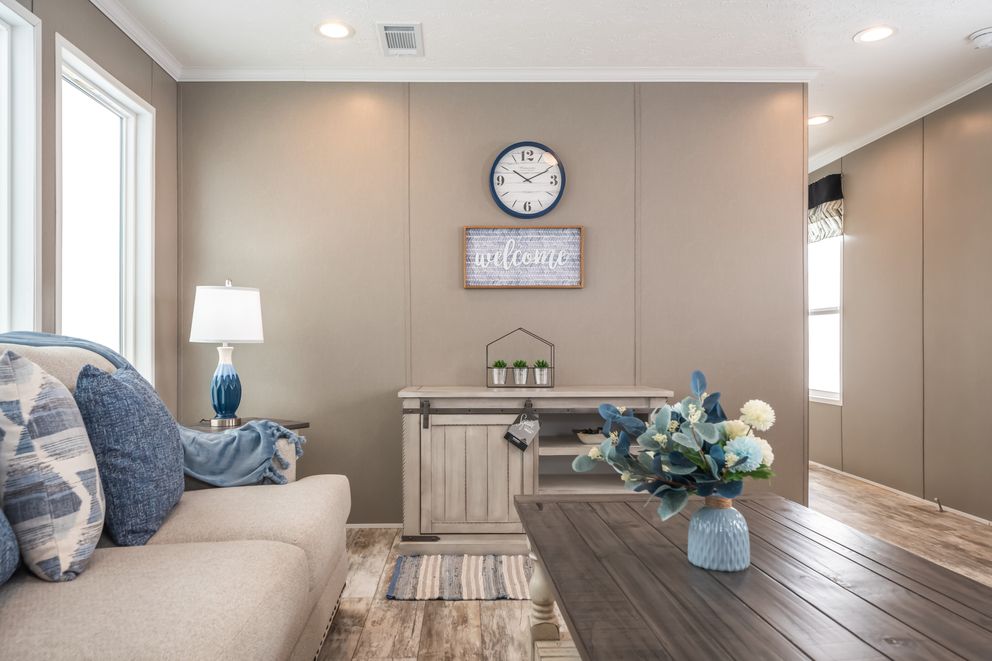 The MAJOR Living Room. This Manufactured Mobile Home features 3 bedrooms and 2 baths.