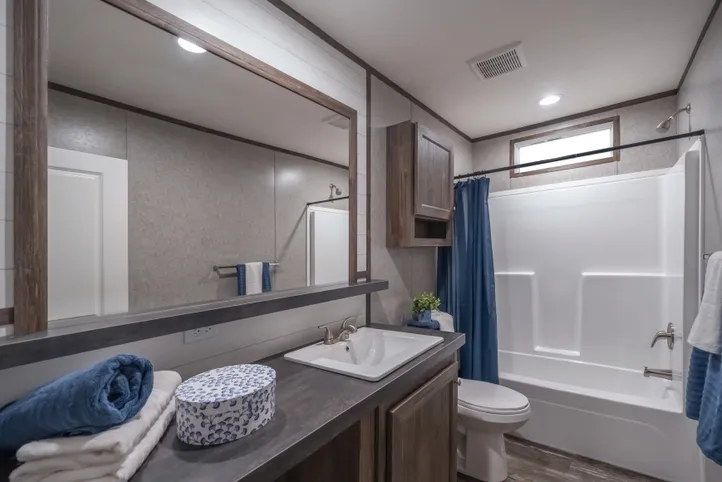The LOCKLEAR Exterior. This Manufactured Mobile Home features 4 bedrooms and 2 baths.