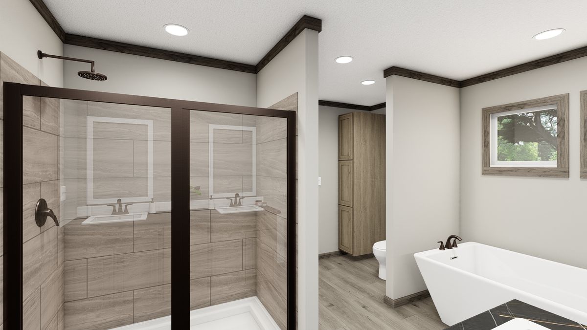 The THE MADISON Primary Bathroom. This Manufactured Mobile Home features 3 bedrooms and 2 baths.