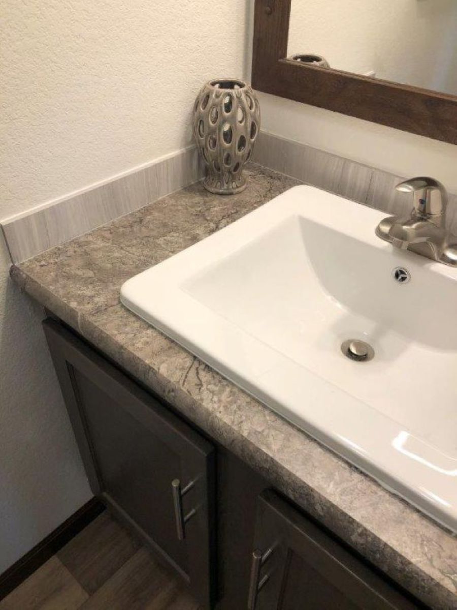 The LEGEND 572-1 MOD Primary Bathroom. This Modular Home features 3 bedrooms and 2 baths.