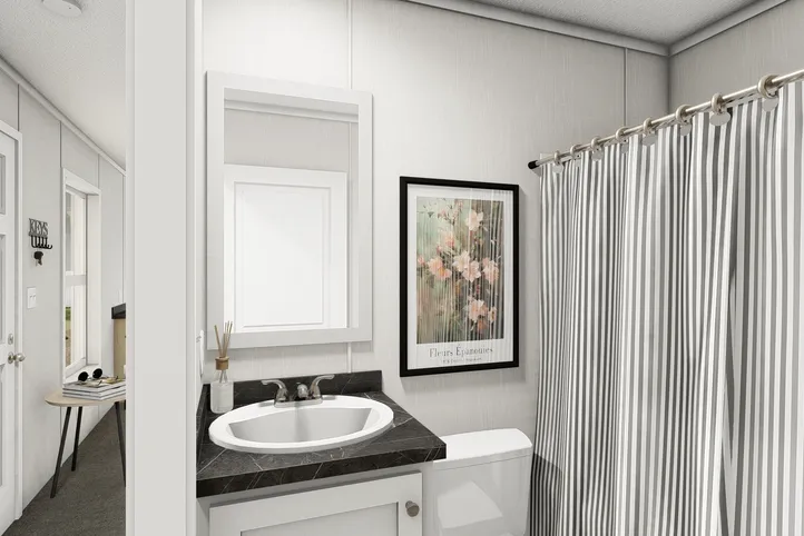 The RUBY Guest Bathroom. This Manufactured Mobile Home features 2 bedrooms and 2 baths.