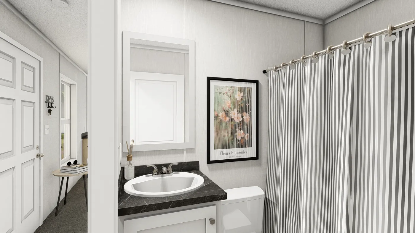 The RUBY Guest Bathroom. This Manufactured Mobile Home features 2 bedrooms and 2 baths.
