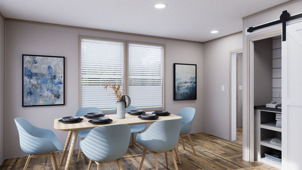 The MOUNTAIN BREEZE 3260 Dining Room. This Manufactured Mobile Home features 3 bedrooms and 2 baths.