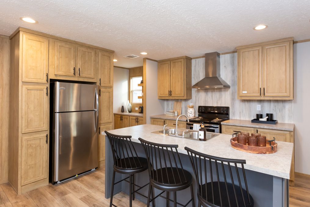 The SYDNEY 8016-1076 Kitchen. This Manufactured Mobile Home features 3 bedrooms and 2 baths.
