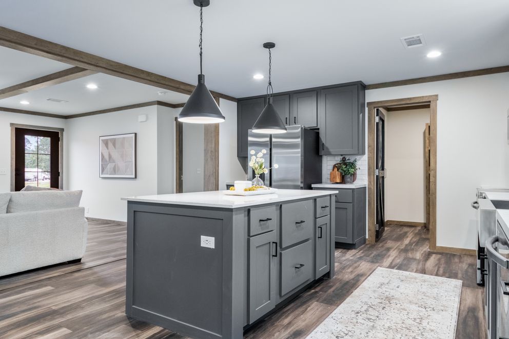 The EVERETT ELITE Kitchen. This Manufactured Mobile Home features 4 bedrooms and 3 baths.