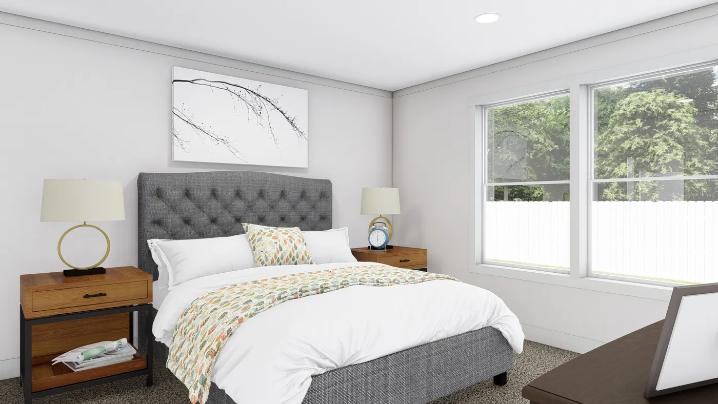 The STAYIN' ALIVE Primary Bedroom. This Manufactured Mobile Home features 3 bedrooms and 2 baths.