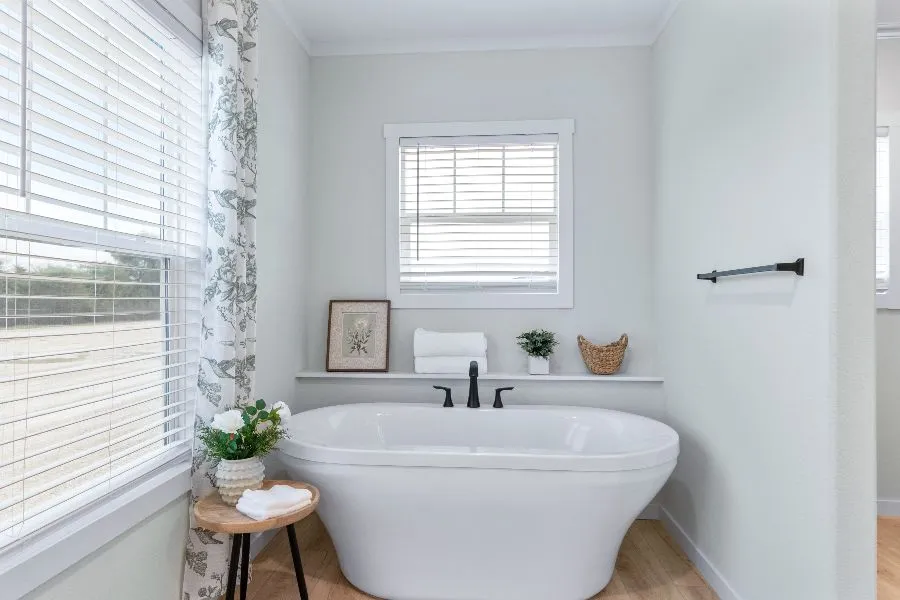 The THE ARCHIBALD Primary Bathroom. This Manufactured Mobile Home features 4 bedrooms and 2 baths.