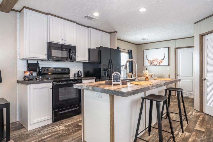 The RIVERHAVEN Kitchen. This Manufactured Mobile Home features 3 bedrooms and 2 baths.