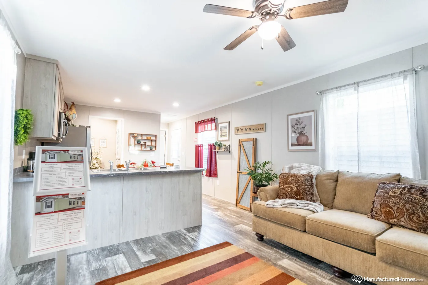 The TOPAZ 70 Living Room. This Manufactured Mobile Home features 3 bedrooms and 2 baths.