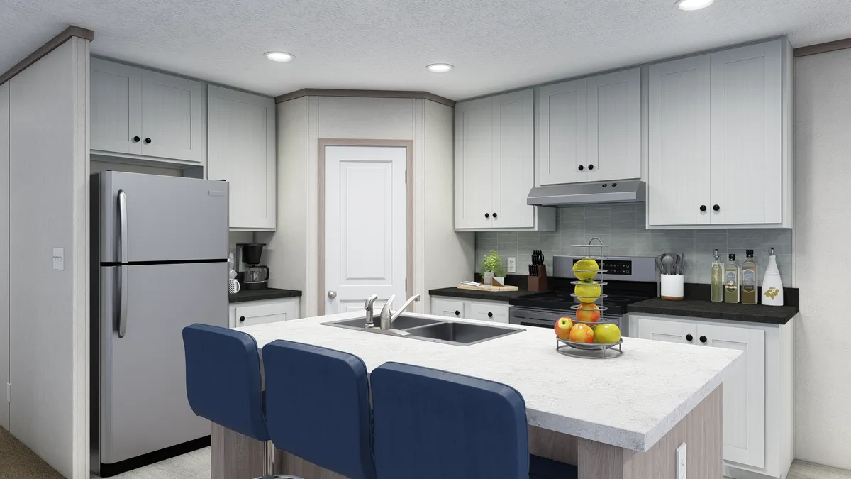 The 5628-E774P THE PULSE Kitchen. This Manufactured Mobile Home features 3 bedrooms and 2 baths.