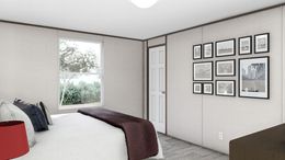 The PRIDE Guest Bedroom. This Manufactured Mobile Home features 4 bedrooms and 2 baths.