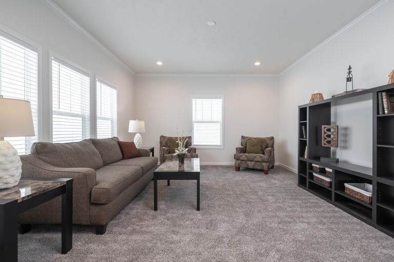 The 4872 ENTERPRISE 32X76 HUD Family Room. This Manufactured Mobile Home features 4 bedrooms and 2 baths.