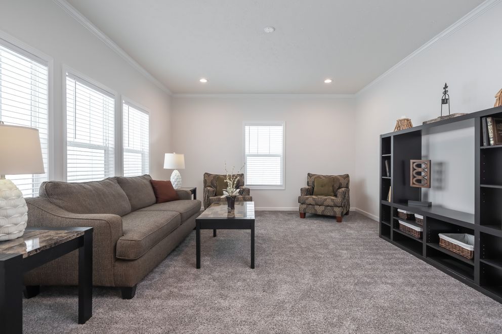 The 4872 ENTERPRISE 32X76 HUD Family Room. This Manufactured Mobile Home features 4 bedrooms and 2 baths.