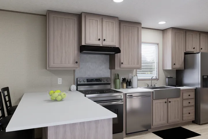 The THE ANNIVERSARY 76 Kitchen. This Manufactured Mobile Home features 3 bedrooms and 2 baths.