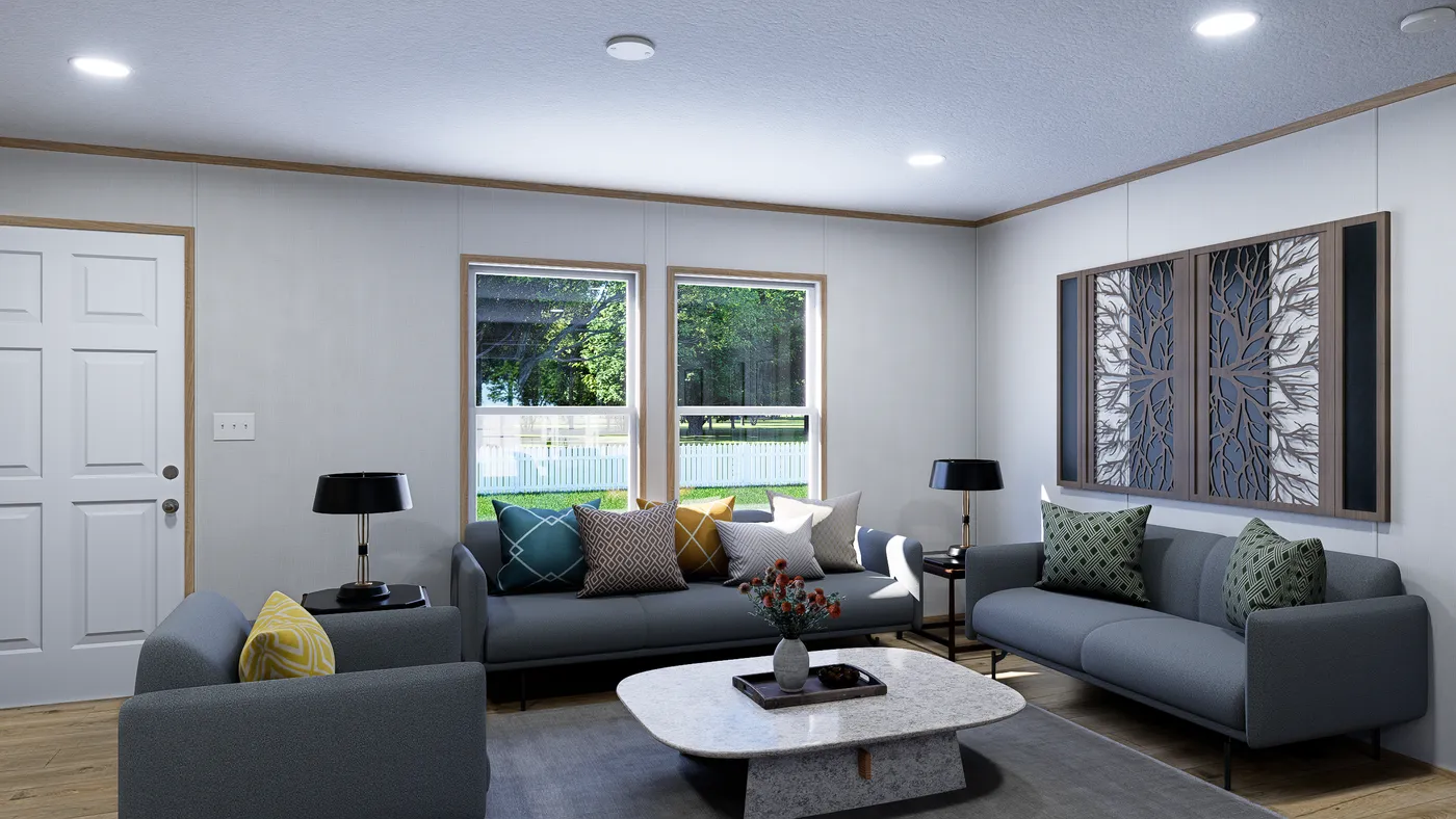 The ECLIPSE Living Room. This Manufactured Mobile Home features 4 bedrooms and 2 baths.