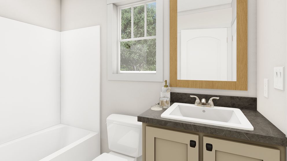 The LAYLA Primary Bathroom. This Manufactured Mobile Home features 2 bedrooms and 1 bath.