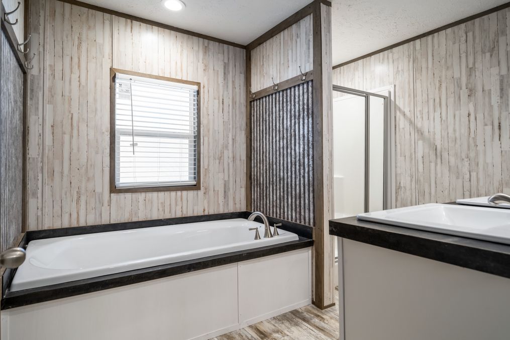 The RIVERHAVEN Exterior. This Manufactured Mobile Home features 3 bedrooms and 2 baths.