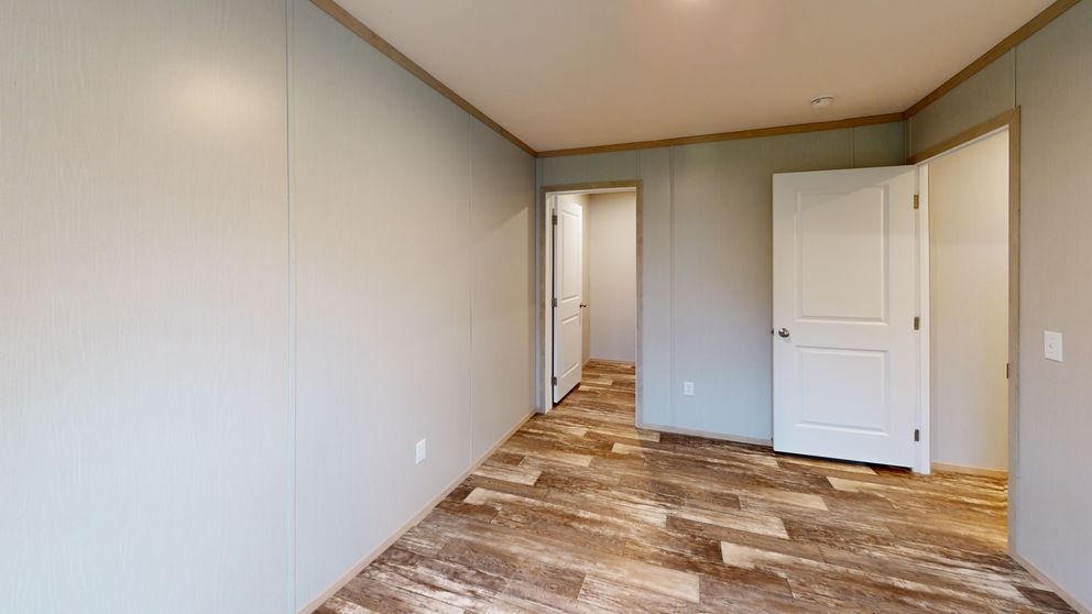 The FRANKLIN Guest Bedroom. This Manufactured Mobile Home features 3 bedrooms and 2 baths.