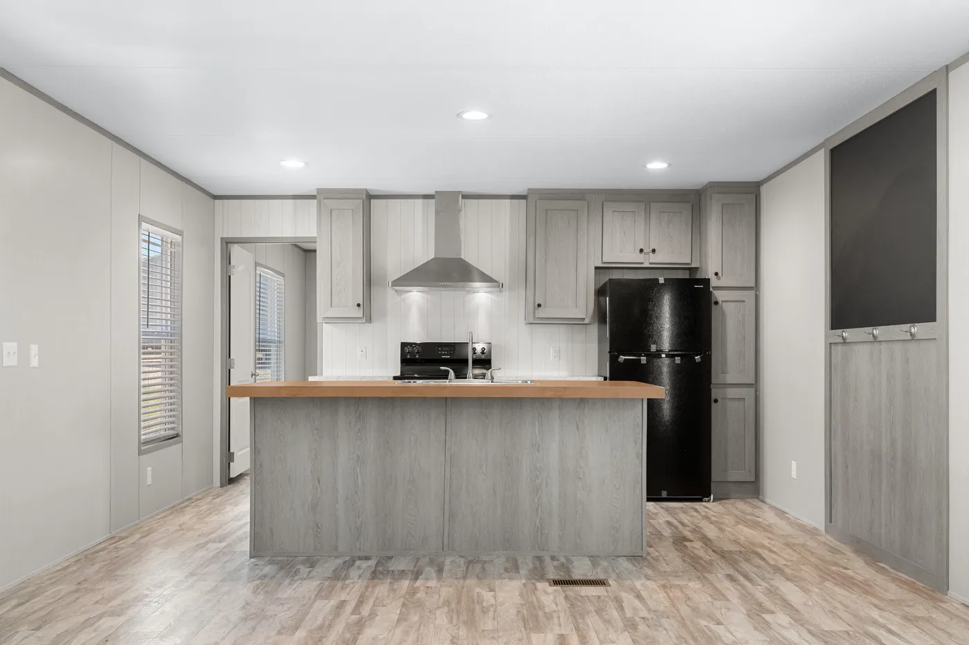 The BREEZE 16763A Kitchen. This Manufactured Mobile Home features 3 bedrooms and 2 baths.