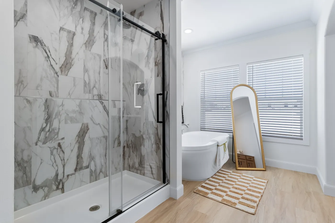 The THE FLORENCE Primary Bathroom. This Manufactured Mobile Home features 3 bedrooms and 2.5 baths.