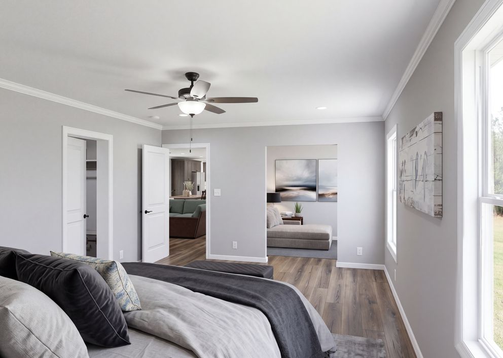 The THE ROOSEVELT Primary Bedroom. This Manufactured Mobile Home features 4 bedrooms and 3 baths.