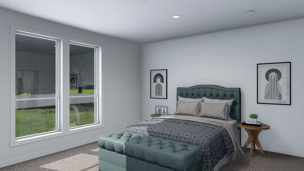 The ACADIA Primary Bedroom. This Manufactured Mobile Home features 3 bedrooms and 2 baths.