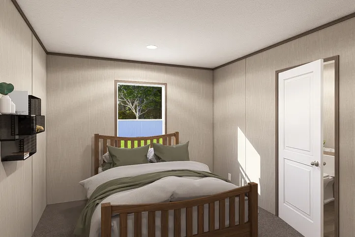 The LEGEND 14X66 Primary Bedroom. This Manufactured Mobile Home features 3 bedrooms and 2 baths.