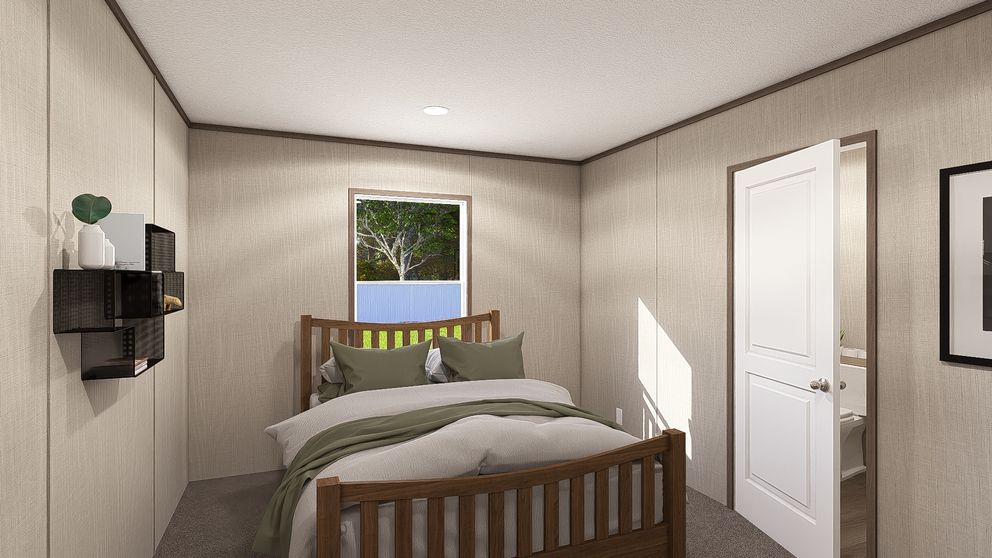 The LEGEND 14X66 Primary Bedroom. This Manufactured Mobile Home features 3 bedrooms and 2 baths.
