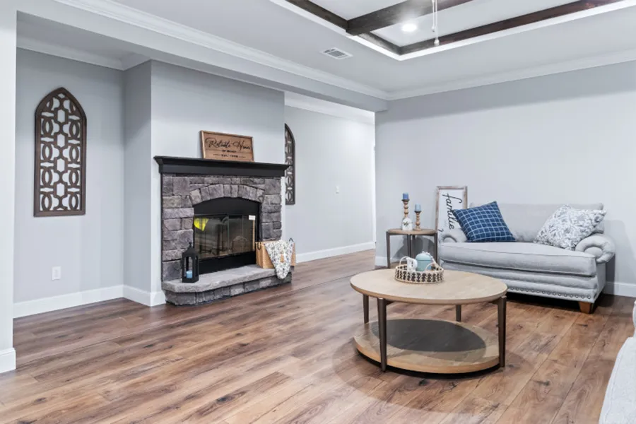 The THE OLYMPUS Living Room. This Manufactured Mobile Home features 4 bedrooms and 3 baths.