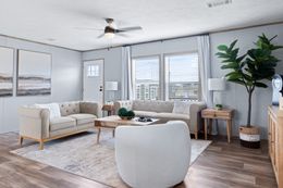 The EL SUENO BREEZE Living Room. This Manufactured Mobile Home features 4 bedrooms and 2 baths.