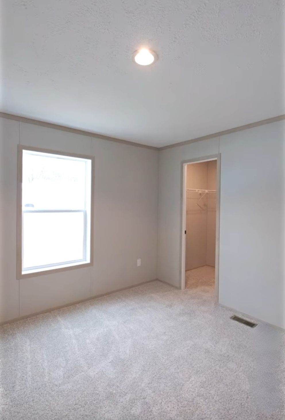 The TURQUOISE Guest Bedroom. This Manufactured Mobile Home features 2 bedrooms and 2 baths.