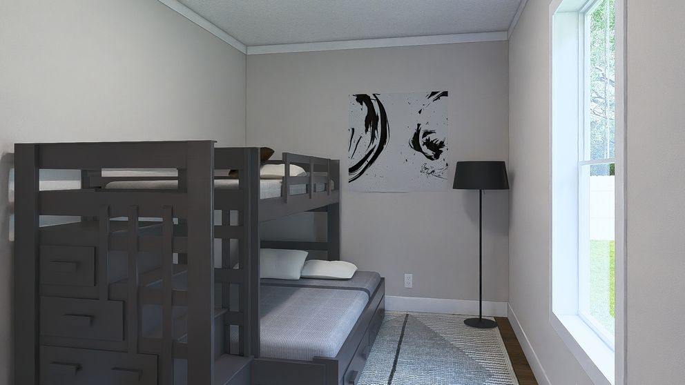 The BORN TO RUN Guest Bedroom. This Manufactured Mobile Home features 2 bedrooms and 2 baths.